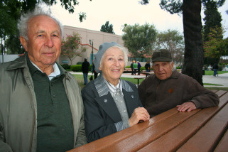 Elya Gelman, 83, from left, with wife Sofia Gelman, 79, and friend Marc Skibinsky, 85, after lighting candles at the Babi Yar memorial at Plummer Park in West Hollywood, Sunday, April 11, 2010.