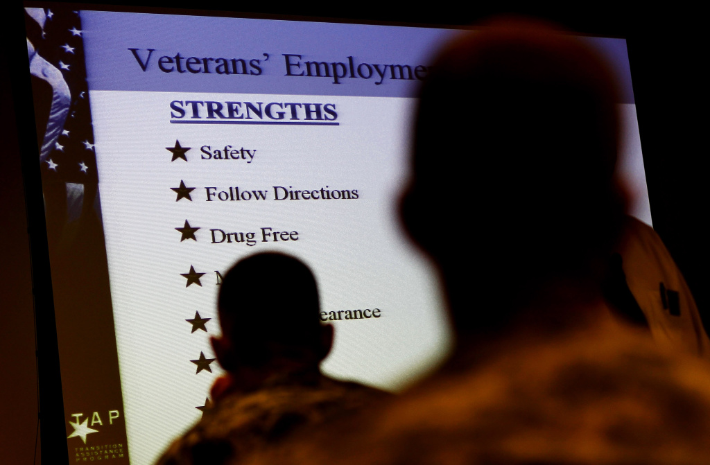 Soldiers Attend Employment Training Sessions To Prepare For Civilian Life FORT BRAGG, NC - AUGUST 2: Soldiers look over a list of attributes about veterans in the civilian workplace during a Transition Assistance Program class on August 2, 2010 in Fort Bragg, North Carolina. The Transition Assistance Program (TAP) helps US troops nearing the end of their military service transition into civilian life by offering job-search assistance, employment classes, and related services. (Photo by Chris Hondros/Getty Images)