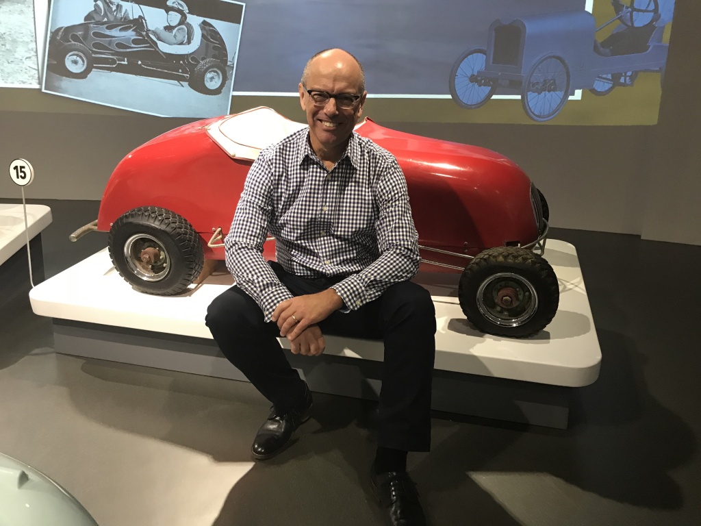 Leslie Kendall, Petersen Museum's chief curator, sits in front of the car he and his parents built when he was a child.
Leslie Kendall, Petersen Museum's chief curator, sits in front of the car he and his parents built when he was a child.