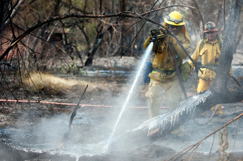 Slideshow Powerhouse Fire Power lines sparked fire that burned 24 homes in 2013 89.3 KPCC