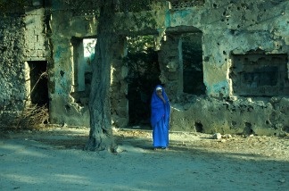 A Somali girl in Mogadishu. The city was once a beautiful, seaside tourist town, but two decades of civil war has left it in ruins.