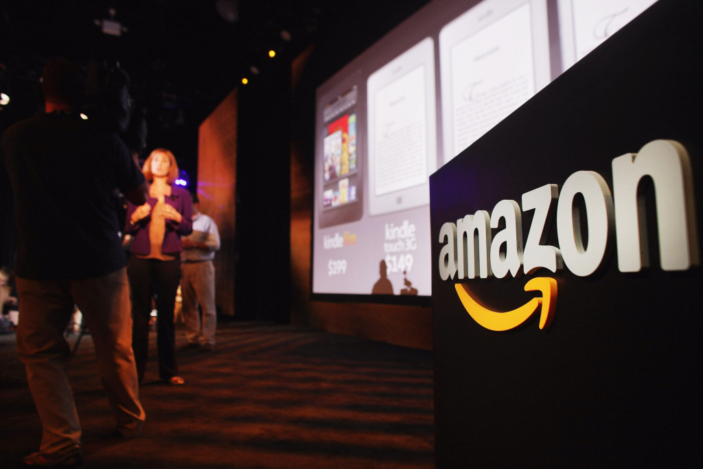 Amazon Introduces New Tablet At News Conference In New York Members of the media cover the launch of the new Amazon tablet called the Kindle Fire on September 28, 2011 in New York City.