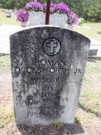 grave1_custom-1136aac9819948326df76bbc4b176eac5b76dde5-s200-c85.jpg Roman Ducksworth's grave at the Cherry Grove Baptist Church, Taylorsville, Miss.
