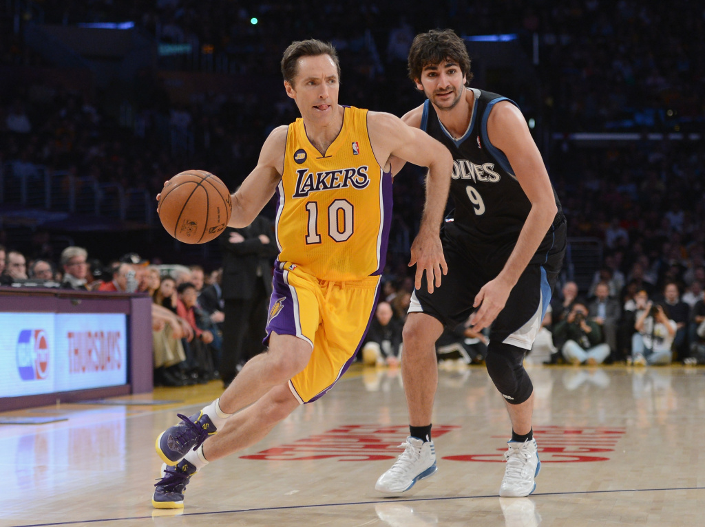 Minnesota Timberwolves v Los Angeles Lakers Steve Nash #10 of the Los Angeles Lakers drives the basket on Ricky Rubio #9 of the Minnesota Timberwolves at Staples Center on February 28, 2013 in Los Angeles, California.