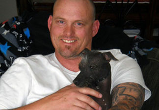 Leif Meisinger, a former Army gunner, says getting Spyder was one of the best things that ever happened to him. He credits his canine companion with helping to ease his PTSD.