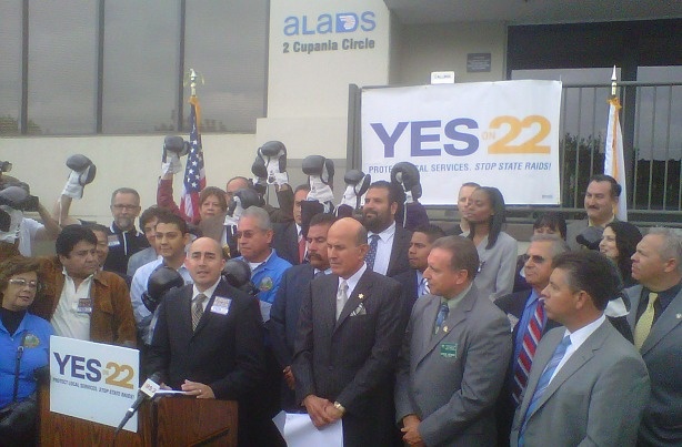 Los Angeles County Sheriff Lee Baca, center, joins local officials, transportation advocates and others at a news conference Oct. 18, 2010 in Monterey Park to rally support for Proposition 22.
