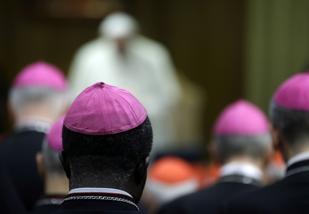 Vatican Family Prelates and Pope Francis attend a morning session of a two-week synod on family issues at the Vatican, Monday, Oct. 13, 2014. (AP Photo/Gregorio Borgia)