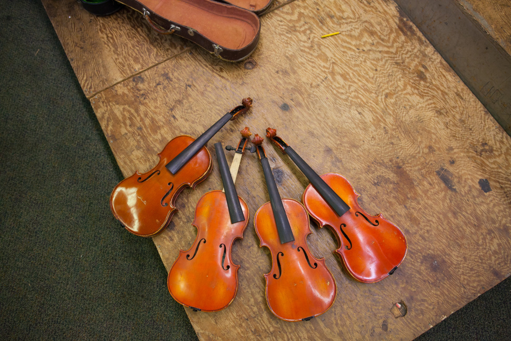 Slideshow Old, broken LAUSD musical instruments holding back some