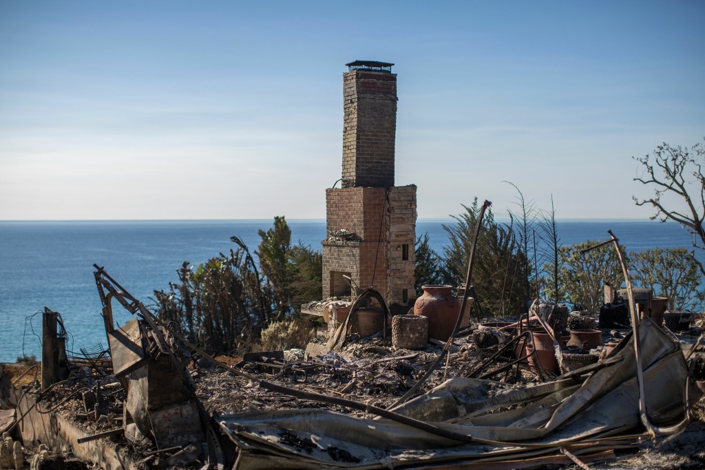 The ruins of an ocean view home are seen in the aftermath of the Woolsey Fire in Malibu, California on November 14, 2018. The ruins of an ocean view home are seen in the aftermath of the Woolsey Fire in Malibu, California on November 14, 2018.
