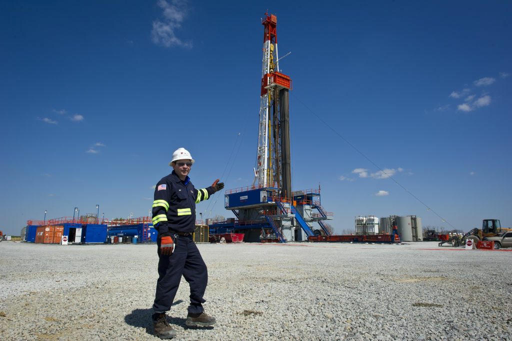 Jeff Boggs, responsible for the drilling at Consol Energy poses infront of one of the company's Horizontal Gas Drilling Rigs exploring the Marcellus Shale outside the town of Waynesburg, PA on April 13, 2012.