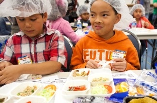 Mercer 16995 Allen, 9, tried out new dishes for next year's menu at the Newman Nutrition Center, the main food distribution point for LAUSD school meals, on Tuesday morning.