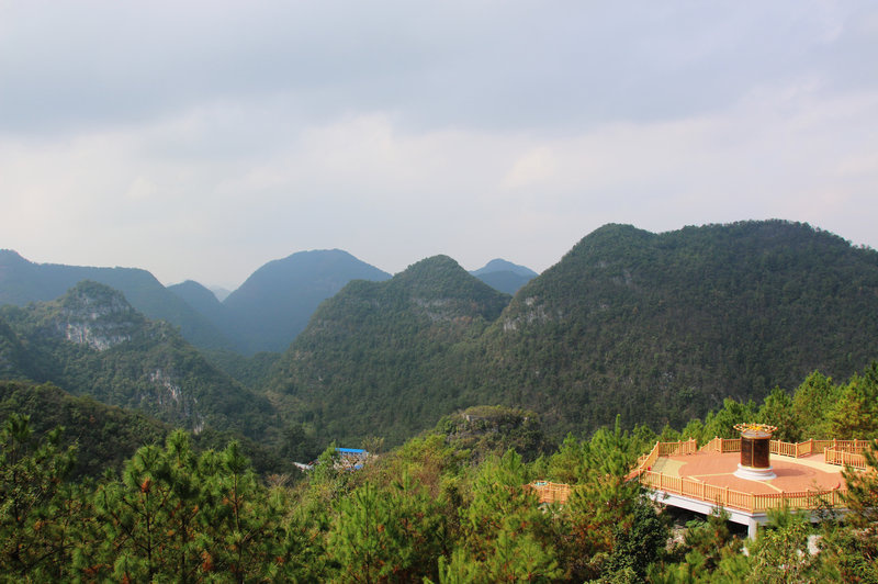 2387587-kuhn-191-edit_custom-8d35c8e538a53da2737a87fd87a468fd50037fed-s800-c85.jpg Guizhou Province's karst mountains surround the telescope and block out interference that would block distant signals.