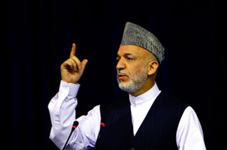 President Hamid Karzai is under pressure from the Obama administration to crack down on government corruption. U.S. officials say the Afghan public perception that government is corrupt could be boosting the Taliban's popularity.