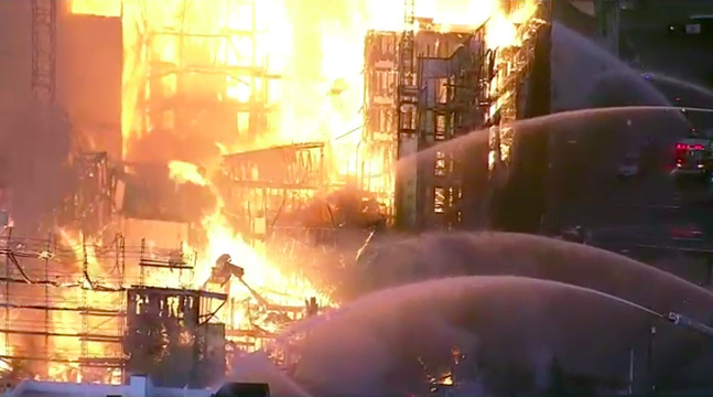 Huge fire burns building under construction in Oakland