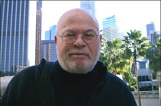 Mercer 7512 New Off-Ramp commentator Sam Hall Kaplan, with his city in the background.