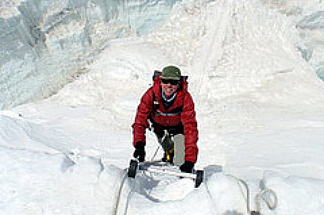 Cal State Fullerton lecturer Cindy Abbott climbs through the Khumbu Icefall.