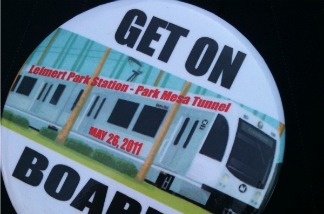 Supporters of a Leimert Park Village stop on Metro's proposed Crenshaw light rail wear these pins.