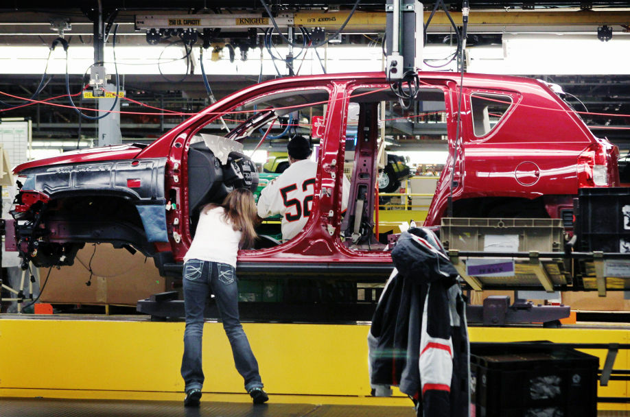 Workers build a Jeep Compass at the Chrysler assembly plant in Belvidere, Ill. Friday's industrial output report showed auto production jumped 4.5 percent in November, leading increases in U.S. manufacturing. Workers build a Jeep Compass at the Chrysler assembly plant in Belvidere, Ill. Friday's industrial output report showed auto production jumped 4.5 percent in November, leading increases in U.S. manufacturing.