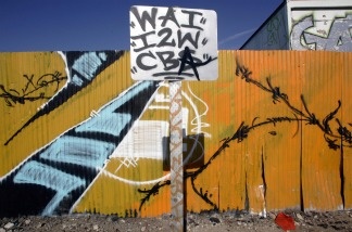 Gang related graffiti is painted on a fence in South Central Los Angeles on Nov. 28, 2006. The recent gang-related shooting in which a 5-year-old boy was killed, is reminiscent of the gangland turf wars of the 1980s and early '90s.
