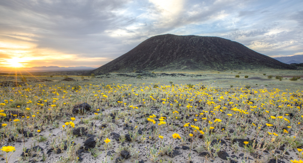 Amboy Crater in the Mojave Desert Amboy Crater is an extinct cinder cone volcano located along Route 66 in the Mojave Desert. Just east of Los Angeles, the Mojave Trails National Monument spans 1.6 million acres and includes mountain ranges, fossil beds and sand dunes.
