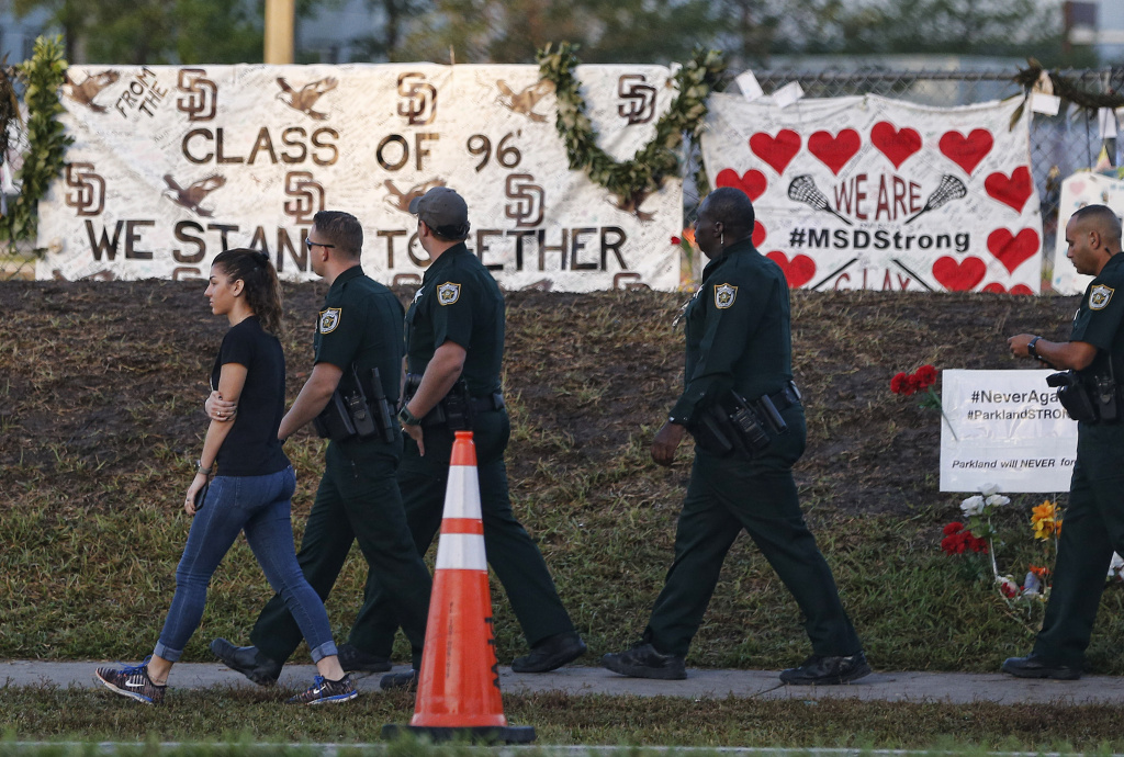 US-SCHOOL-SHOOTING Marjory Stoneman Douglas High School staff, teachers and students return to school greeted by police and well wishers in Parkland, Florida on February 28, 2018.
