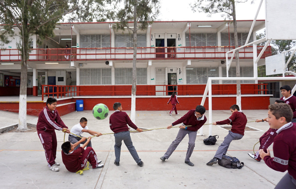 mexischool_005_custom-3609b820697e63c1e4dc735e3ec57877d571ff61-s1300-c85.jpg Students play during recess at the Eucario Zavala Secondario 63 school in Tijuana.