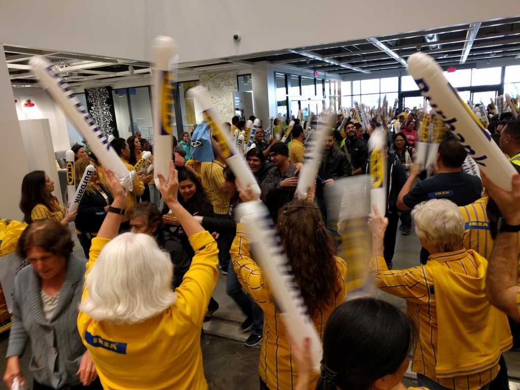 IKEA staffers welcome shoppers to the new store in Burbank with cheers and boomsticks. IKEA staffers welcome shoppers to the new store in Burbank with cheers and boomsticks.