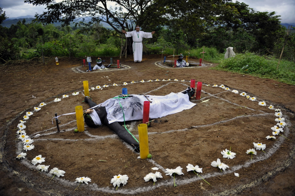 COLOMBIA-BELIEF-EXORCISM-RITUAL Hermes Cifuentes, 50, aka Brother Hermes, performs an exorcism on June 1, 2011, in La Cumbre, Valle del Cauca department, Colombia.