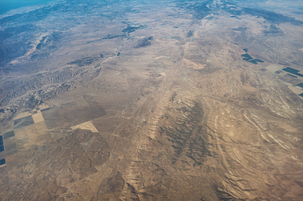 San Andreas Fault An aerial view of a stretch of the San Andreas Fault north of the Carrizo Plain, east of San Luis Obispo and Paso Robles. The fault runs from top to bottom down the center of the photo.