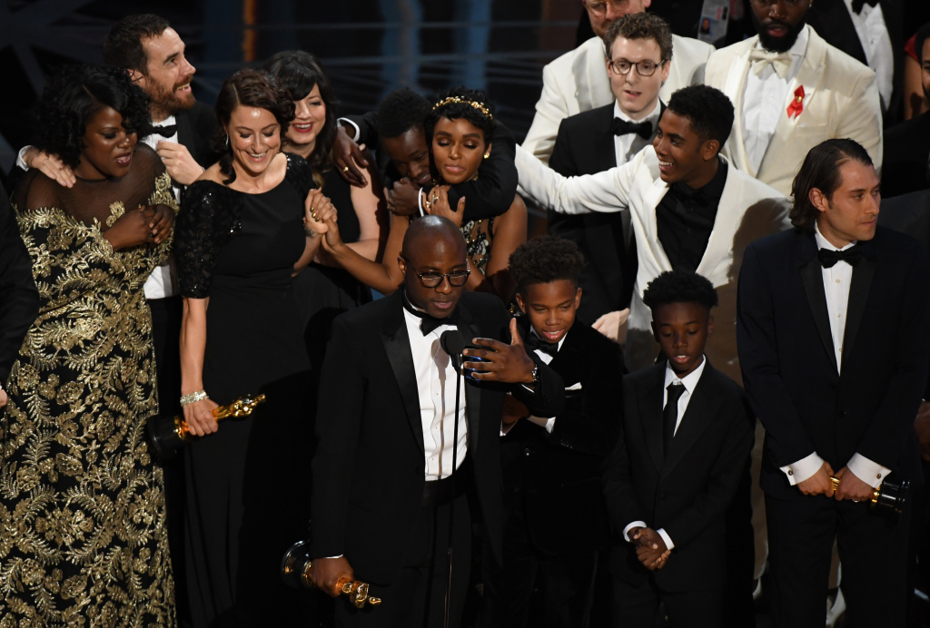 US-OSCARS-SHOW US director Barry Jenkins (center) speaks after