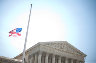 WASHINGTON - JUNE 28: A flag flies at half staff outside the U.S. Supreme Court building in honor of Sen. Robert C. Byrd (D-WV), who died this morning.