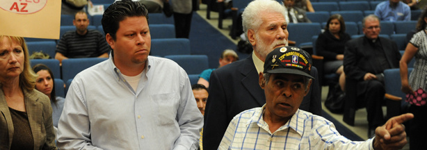 Anti-boycott protesters shout at Los Angeles County supervisors before they went on to vote 3-2 for Los Angeles County to join a boycott of the state of Arizona, in Los Angeles on June 1, 2010.