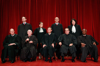 Members of the US Supreme Court pose for a group photograph at the Supreme Court building on September 29, 2009 in Washington, DC.