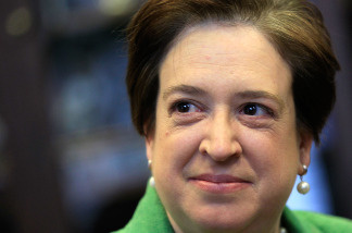 U.S. Supreme Court nominee, Solicitor General Elena Kagan smiles as she meets with Sen. John Cornyn (R-TX) on Capitol Hill May 18, 2010 in Washington, DC.