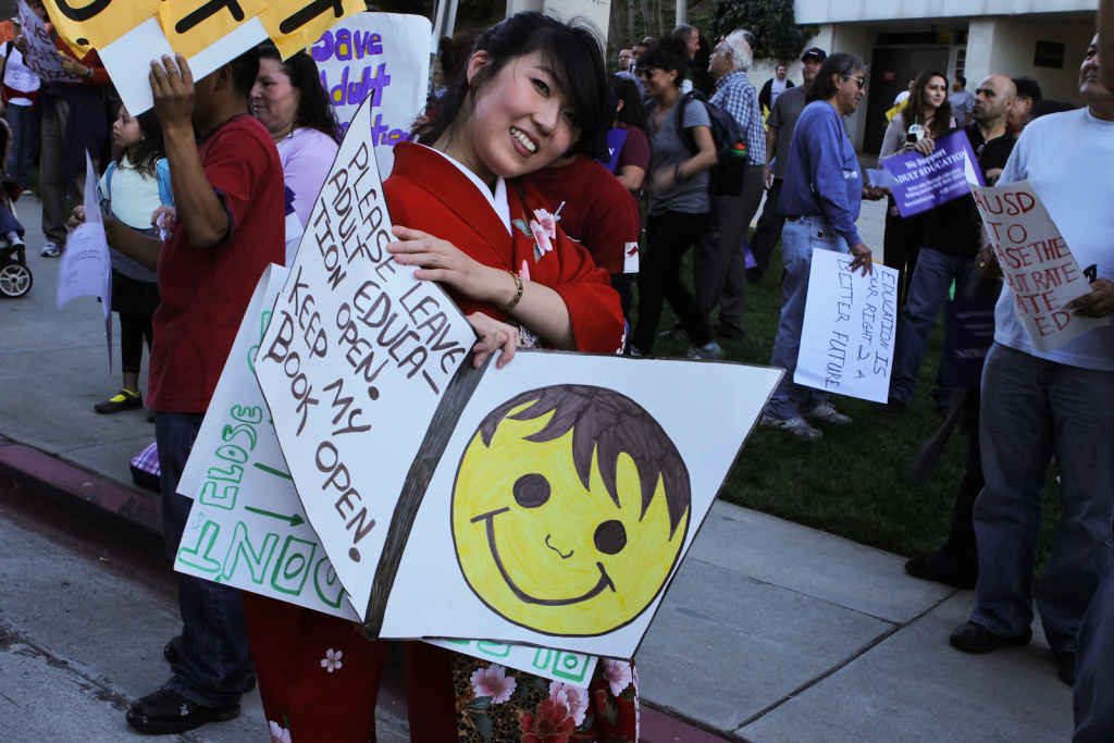 Adult Education Rally A protester holds a sign at a rally outside of LAUSD headquarters at an adult education rally in downtown Los Angeles.