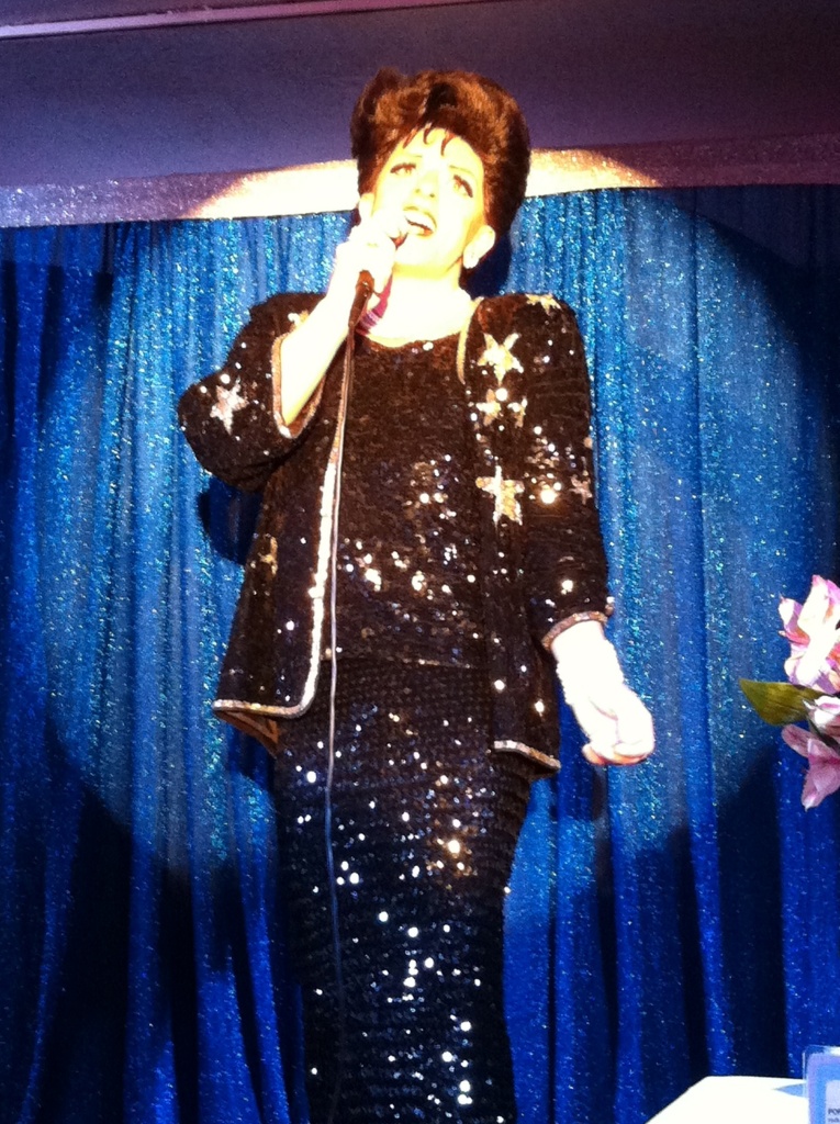 Peter Mac as Judy Garland at the French Marketplace in West Hollywood. Peter Mac as Judy Garland at the French Marketplace in West Hollywood.