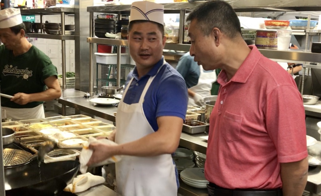 SGV Gas Stoves Chef Chun Lei (l.) and restaurant owner Charles Lu (r.) in the kitchen of Shanghailander Palace in Arcadia.