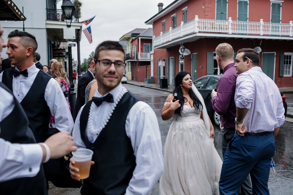 US-WEATHER-HURRICANE-NATE Newlywed Kaila Hager and her wedding party visit Lafitte's Blacksmith Bar in New Orleans on Saturday, October 7, 2017 as rain from Hurricane Nate pours down.