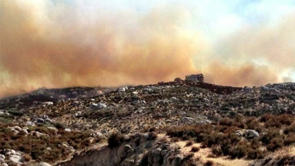 A house threatened by the Silver Fire, Wednesday, Aug. 7, 2013. A house threatened by the Silver Fire, Wednesday, Aug. 7, 2013.