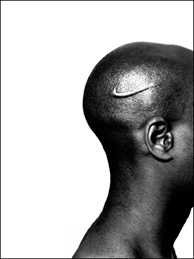 Mercer 7421 Hank Willis Thomas, Branded Head, 2003; digital type C print; collection of David Alan Grier, Los Angeles.