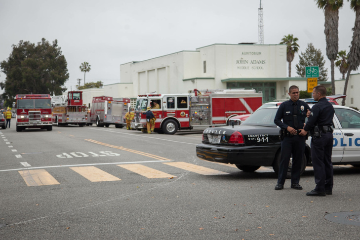 A student waits on the periphery of the Santa Monica College campus on Friday afternoon.
