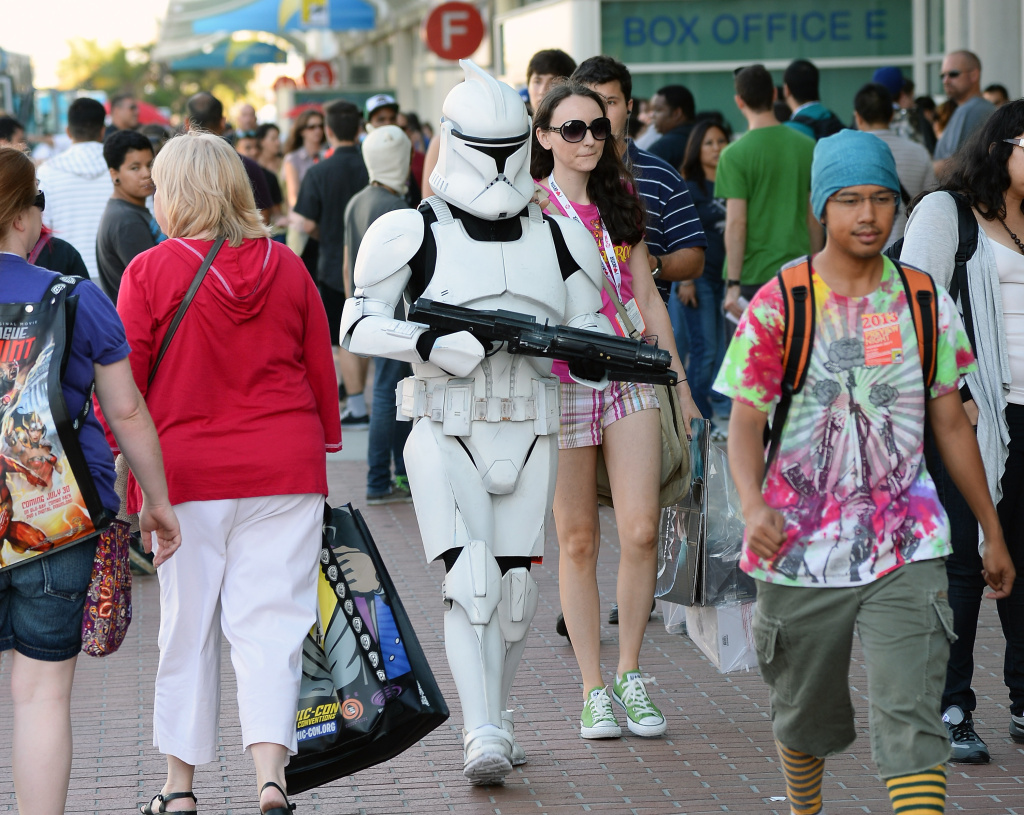 San Diego Prepares For Comic-Con International 2013 Myke Soler (C) of California walks outside the San Diego Convention Center dressed as a clone trooper from the