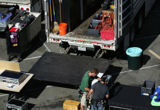 An on-location set for the filming of a movie by a major studio is filled with truckloads of equipment on November 18, 2006 in Los Angeles, California. File photo.