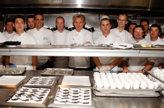 Chef Gordon Ramsay poses in the kitchen with his staff at the celebration opening party of his new Los Angeles restaurant at The London West Hollywood June 4, 2008 in West Hollywood, California