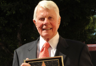 Actor Peter Graves celebrates after he was honoured with a star on the 'Hollywood Walk Of Fame' in Hollywood on October 30, 2009. He died March 14, 2010 in Los Angeles at age 83.