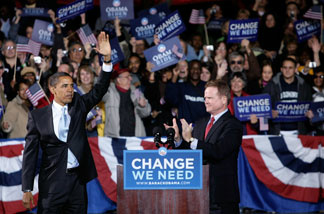 File photo: Barack Obama (L) waves to supporters as Sen. Jim Webb (D-VA) looks on during a campaign rally at Verizon Wireless Virginia Beach Amphitheater October 30, 2008 in Virginia Beach, Virginia.