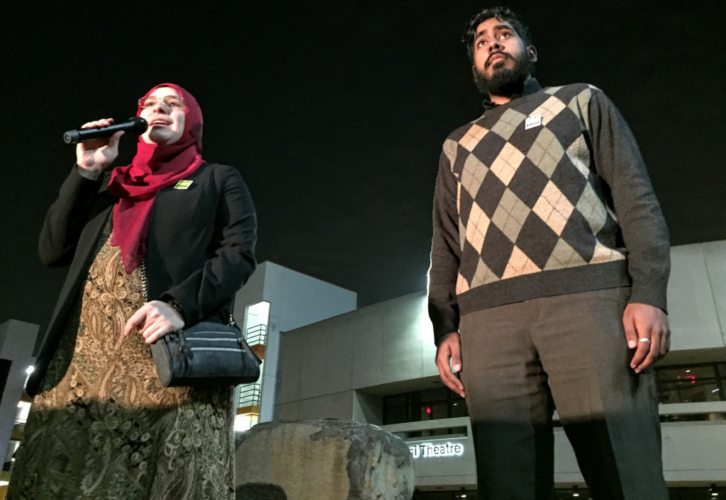 Japanese Americans Muslim rally (From l. to r.) Duaa Alwan of the Islamic Shura Council of Southern California addresses the vigil-goers with Syed Hussaini of the Council of American-Islamic Relations.