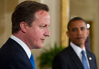 British Prime Minister David Cameron, left, speaks alongside US President Barack Obama during a joint press conference in the East Room of the White House in Washington, DC, July 20, 2010. Prime Minister David Cameron ordered a review Tuesday of documents regarding the release of the Lockerbie bomber, but ruled out an inquiry into allegations of BP's involvement.