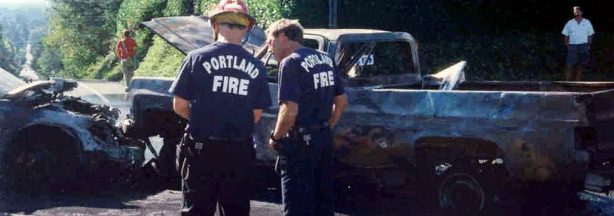 Firefighters respond to a fiery collision involving a side-saddle pickup in Portland, Ore., in August 2003. The truck ran a stop sign and was struck by the car, puncturing the truck's fuel tank and setting off a fireball and loud explosions. A 59-year-old passenger in the car suffered third-degree burns but survived.