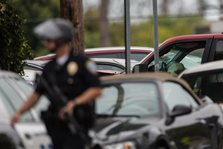 A student waits on the periphery of the Santa Monica College campus on Friday afternoon.
